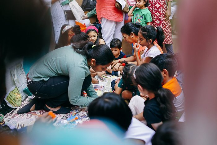 Children at a craft workshop table