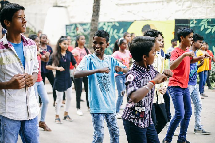 Children dancing together in a workshop